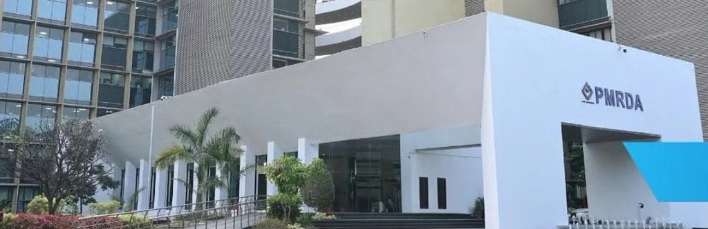 Pune Inner Ring Road Meetings: The PMRDA headquarters building in Pune, where land acquisition meetings for the Inner Ring Road project are being held.